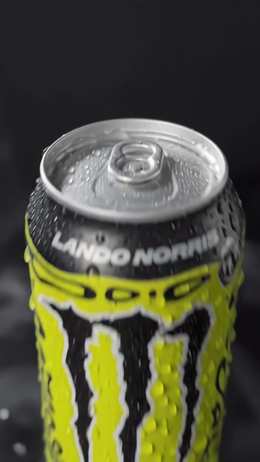 Close-up of the can top, beaded with condensation
