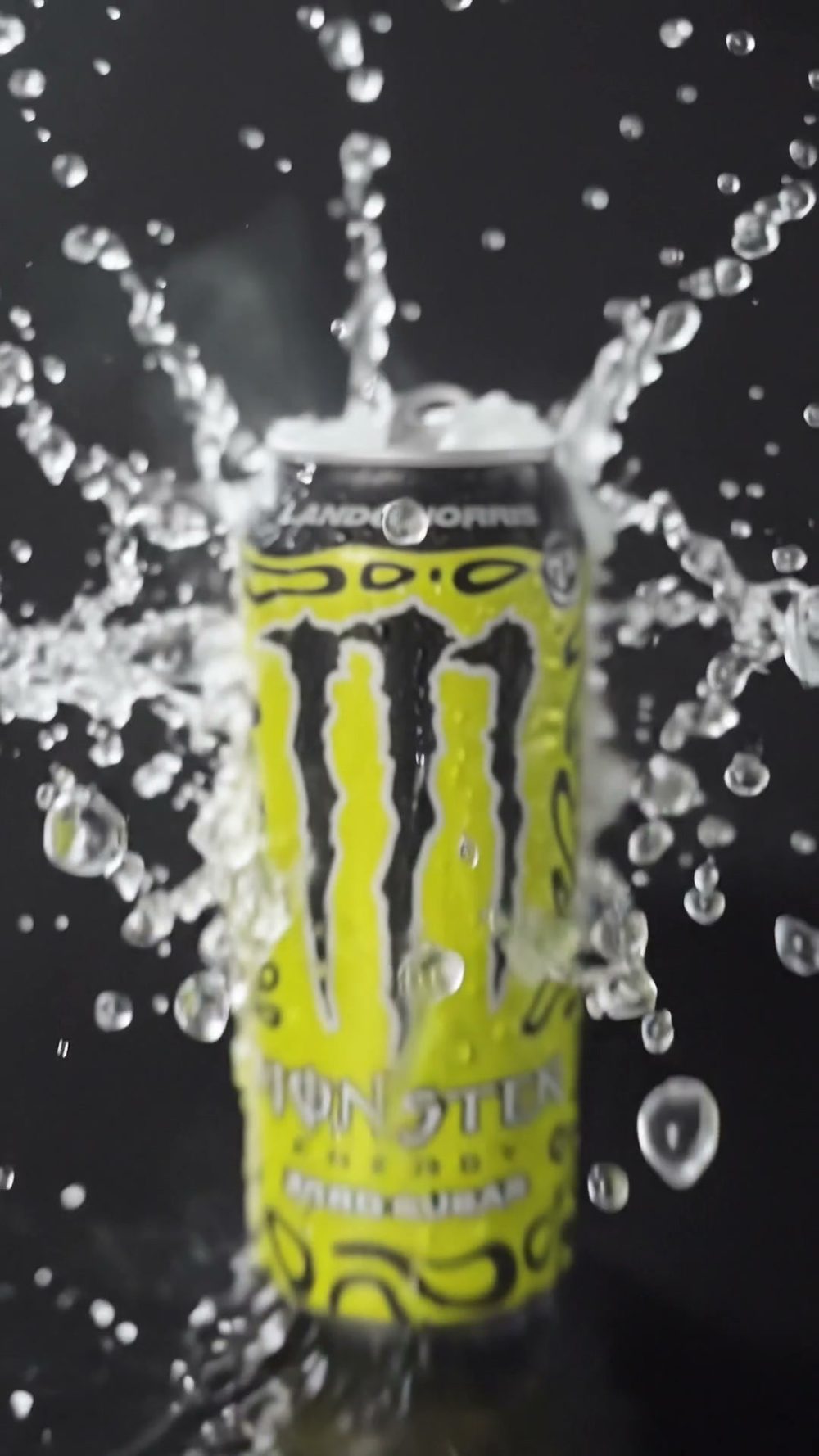Droplets spraying out around the can